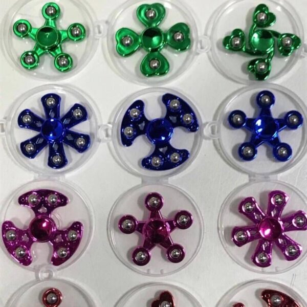 The Metal Shining Spinner is a hand-held toy designed for stress relief and relaxation. Typically made from metal, it features a spinning mechanism that allows users to rotate it between their fingers. The spinning motion is not only entertaining but also believed by some to provide a calming effect. The metal construction adds a durable and sleek element to the spinner. It's commonly used as a fidget toy, providing a simple yet effective way to alleviate stress and anxiety by promoting focus and relaxation through tactile stimulation.
