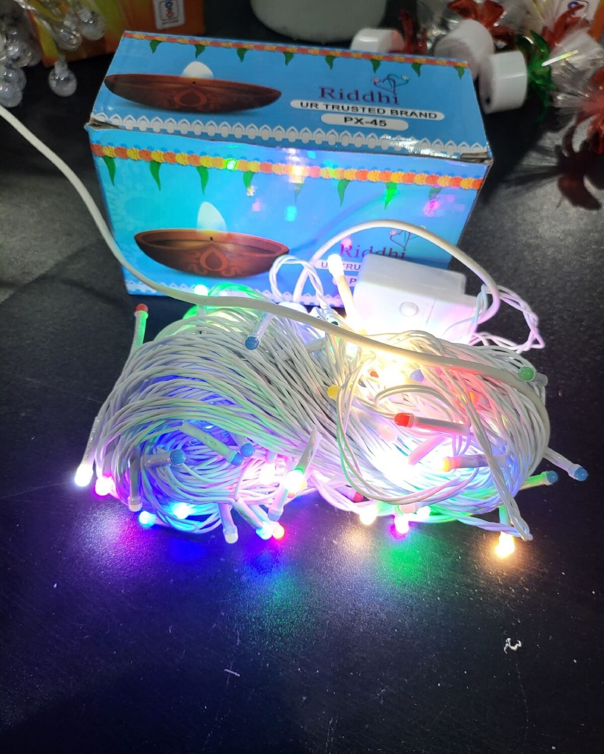 The "PIXEL Multi-Color 45 Meter (PX-45) White Wire" is a string of LED lights with a length of 45 meters. The term "PIXEL" suggests individual addressable LEDs, enabling programmable and intricate lighting effects. The "Multi-Color" feature indicates the ability to display a variety of colors. The "PX-45" may be a model or product identifier. Additionally, the "White Wire" specifies that the wiring is white, possibly providing a neutral or subtle look. This LED light string is suitable for creating dynamic and customizable lighting displays for various settings.