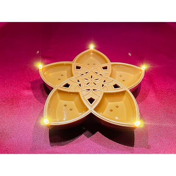The Panchmukhi 5-in-1 Sensor LED Diya is a modern take on traditional lighting. Featuring a five-faced design, each section is equipped with a sensor-activated LED light, providing a versatile and convenient lighting experience. This innovative diya seamlessly blends cultural aesthetics with contemporary technology, making it ideal for creating a festive or serene atmosphere during religious ceremonies or as a decorative element in your home.