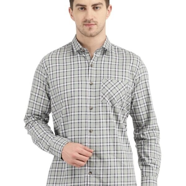Made from high-quality fabric, the shirt ensures comfort throughout the day, making it suitable for long hours at the workplace or formal events. The green and white checks create a balanced and versatile design, allowing you to pair it with various trousers or suits.